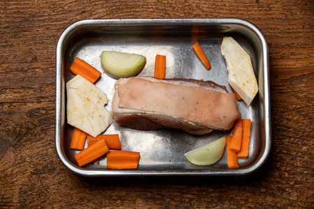 raw pork shoulder in a casseroleの写真素材