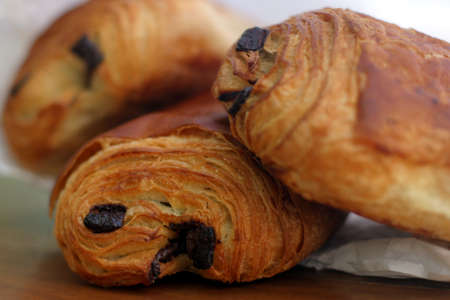 Pain au Chocolat - A croissant filled with chocolate! Tasty and delicious traditional French breakfast pastry, fresh from the bakery.の写真素材