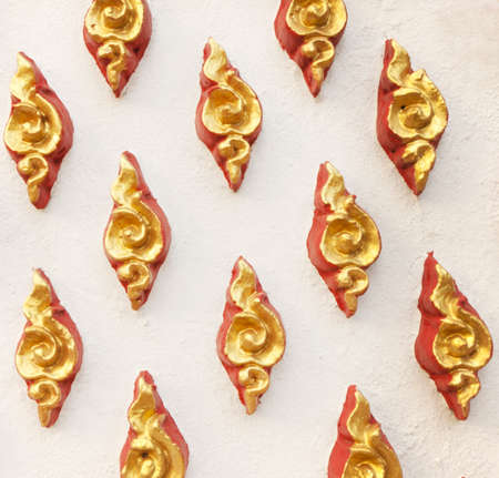 Pattern of Buddhist temples in Thailand have built a wall of delicate and beautiful, in which each region has different culture, it is different.の写真素材