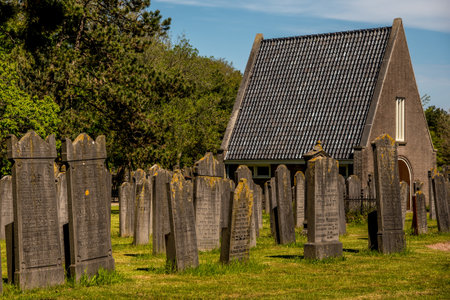 Den Helder, the Netherlands. June 3, 2021.The old dilapidated graves of the Jewish cemetery in Den Helder, the Netherlands. High quality photo.のeditorial素材