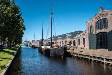 Den Helder, the Netherlands. July 2021. Old sailing boats in the harbor of Den Helder, the Netherlands. High quality photoの写真素材