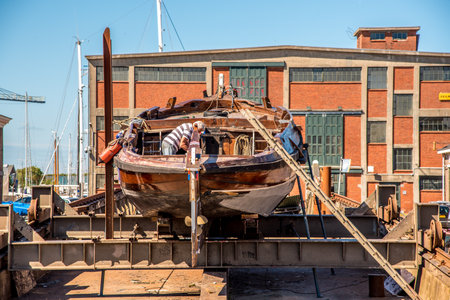 Den Helder, the Netherlands. 8 july 2021. Historic flatboat on the slipway at the Willemsoord shipyard in Den Helder. High quality photoのeditorial素材