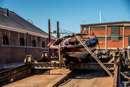 Den Helder, the Netherlands. 8 july 2021. Historic flatboat on the slipway at the Willemsoord shipyard in Den Helder. High quality photoのeditorial素材