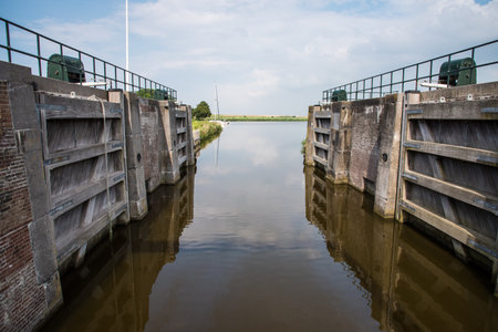 Den Helder, the Netherlands. 31 July 2021. The locks in a canal to bridge water level differences. High quality photoの写真素材