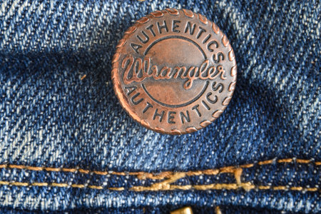 Den Helder, the Netherlands. September 2021. Close up of the buttons on a pair of jeans. High quality photoのeditorial素材