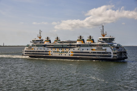 Texel, the Netherlands. September 2021. A passing ferry on its way to the island of Texel. High quality photoのeditorial素材