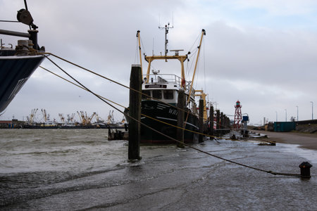 Den Oever, the Netherlands. January 2022. High tide in the harbor of Den Oever, Netherlands. High...