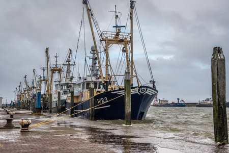 Den Oever, the Netherlands. January 2022. High tide in the harbor of Den Oever, Netherlands. High...