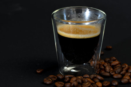Den Helder, the Netherlands. January 2022. Close up of coffee with cognac on black background. High...