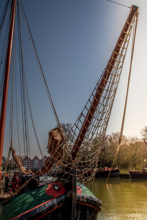 Hoorn, Netherlands, March 2022. The harbor of Hoorn with the old boats and historic facades. High quality photoのeditorial素材