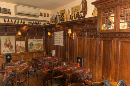 Amsterdam, Netherlands, March 2022. The interior of an old brown pub in Amsterdam. High quality photoのeditorial素材