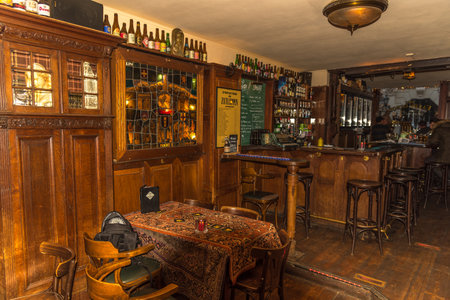 Amsterdam, Netherlands, March 2022. The interior of an old brown pub in Amsterdam. High quality photoのeditorial素材