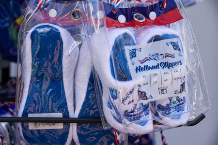 Lisse, Netherlands, April 2022. Traditional souvenirs from Holland, clogs and Delfts Blauw. High...