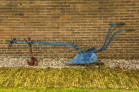Beemster, Netherlands, May 2022. A traditional farm with old-fashioned agricultural tools. High quality photoのeditorial素材