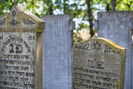 Den Helder, Netherlands, June 2022. Old dilapidated graves at the Jewish cemetery in Den Helder. High quality photo. Selective focus.のeditorial素材