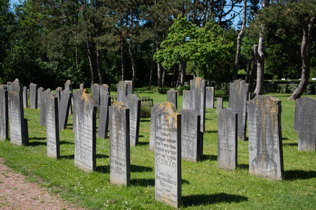 Den Helder, Netherlands, June 2022. Old dilapidated graves at the Jewish cemetery in Den Helder. High quality photo. Selective focus.のeditorial素材