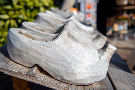 Enkhuizen, Netherlands. June 2022. The process of manufacturing wooden shoes. High quality photo