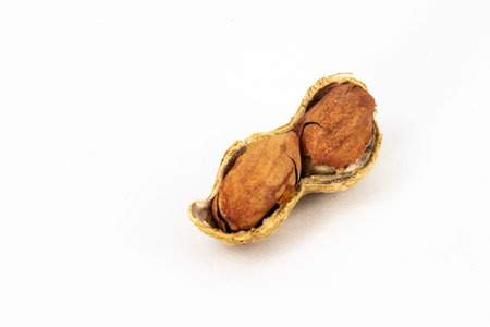 Netherlands. October 2022. Peanuts, isolated on white background. High quality photo