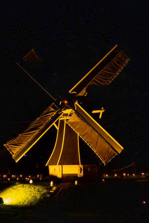 Enkhuizen, Netherlands. October 2022. The illuminated windmill near Enkhuizen. High quality photoの写真素材