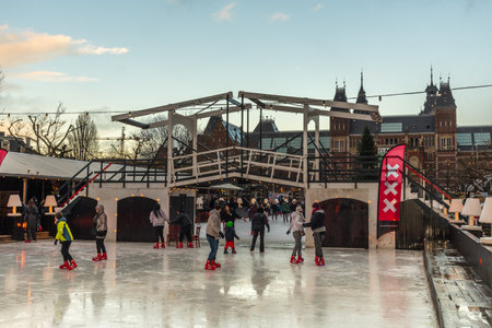 Amsterdam, Netherlands. December 2022. The ice skating rink on the Museumplein in Amsterdam. High quality photoのeditorial素材