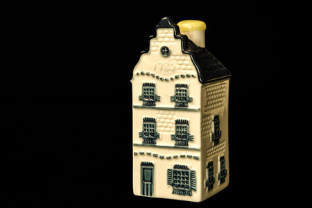 Den Helder, Netherlands. December 2022. Ceramic houses with Dutch gables on a black background. High quality photoの写真素材