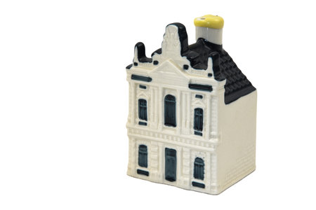 Den Helder, Netherlands. December 2022. Ceramic KLM houses with Dutch gables, filled with gin, on a white background. High quality photoの写真素材