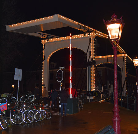 Amsterdam, Netherlands. January 2023. An illuminated drawbridge in downtown Amsterdam. High quality photoの写真素材