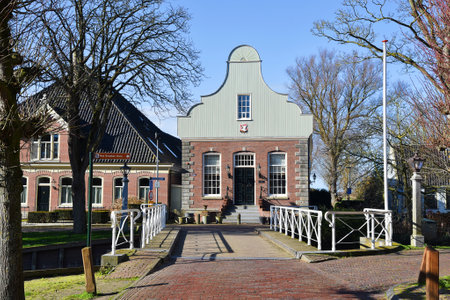 Broek in Waterland, Netherlands. February 2023. The wooden facades and old houses in Broek in Waterland, Holland. High quality photoのeditorial素材