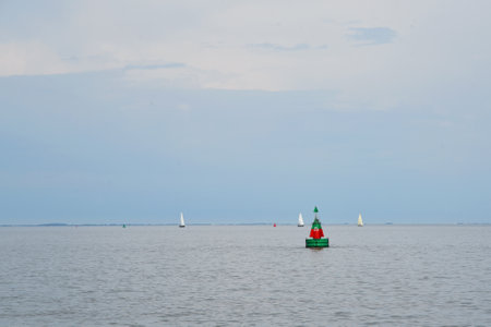 Den Oever, Netherlands. July 9, 2023. The buoys for shipping on the Wadden Sea. High quality photoの写真素材