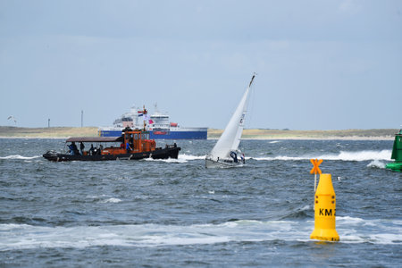 Den Oever, Netherlands. July 9, 2023. Sailing boats on the Wadden Sea. High quality photoのeditorial素材