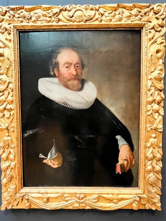 Amsterdam, Netherlands. August 11, 2023. Close up of a famous oil painting of a merchant from the 17th century. High quality photoのeditorial素材