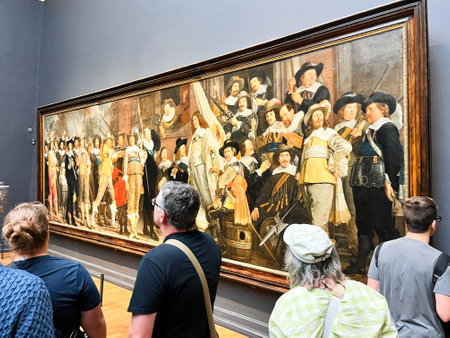 Amsterdam, Netherlands. August 6, 2023. A visitor taking pictures of famous paintings. . High quality photoのeditorial素材