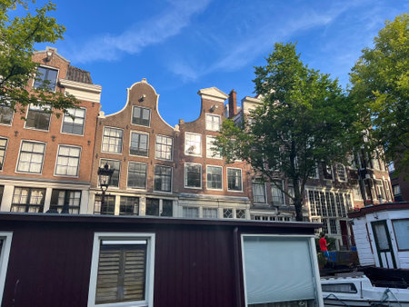 Amsterdam, Netherlands. August 29, 2023. The canals of Amsterdam with the historic gables. High quality photoのeditorial素材
