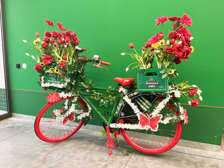 Amsterdam, the Netherlands. June 10, 2024. A bike decorated with flowers at the Heineken brewery. High quality photoのeditorial素材