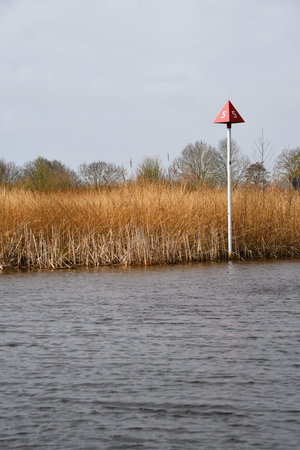 Giethoorn, the Netherlands. march 29, 2025. The reeds and a beacon on the Beulakker meadow near Giethoorn. High quality photoの写真素材