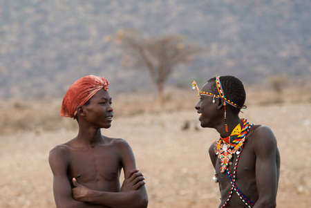 Masai warriors in Kenya talking to eachotherのeditorial素材