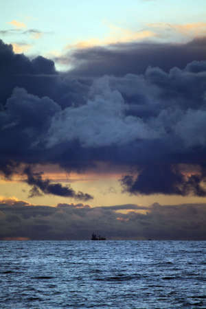 Ship heading out to seaの写真素材