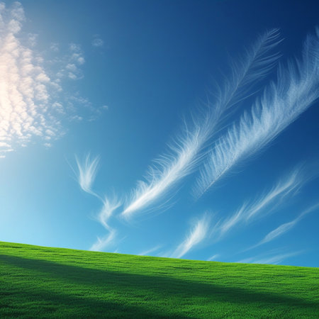Green field and blue sky with white clouds. Nature landscape background. Feathery Clouds over Green Field A Majestic Blue Sky Adorned with Delicate Wispy Clouds Castingの素材