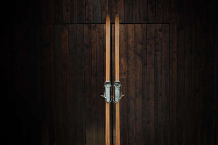 Wooden skis on a wooden wallの写真素材