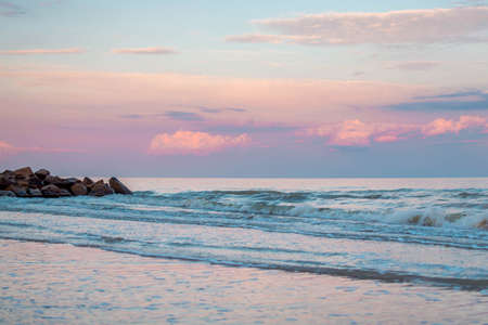 pink sunset on the evening beachの写真素材