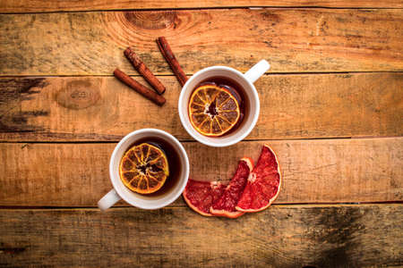 two cups of tea with grapefruitの写真素材