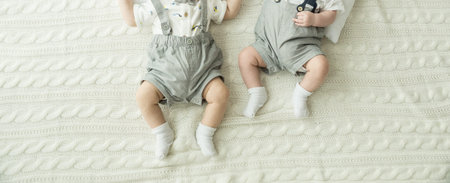 Baby feet in mother hands. Tiny Newborn Baby's feet on female Shaped hands closeup. Mom and her Child. Happy Family concept. Beautiful conceptual image of Maternityの写真素材