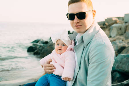 Happy loving family. Father and his daughter child girl playing together.の写真素材