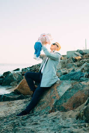 Happy loving family. Father and his daughter child girl playing together.の写真素材