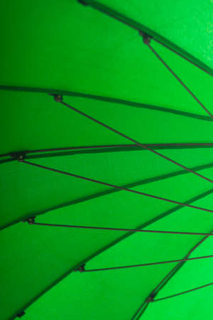detail of a green sunshade Beach umbrellaの写真素材