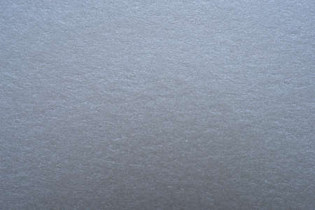 textured background, designer cardboard embossed paper macro shotの写真素材