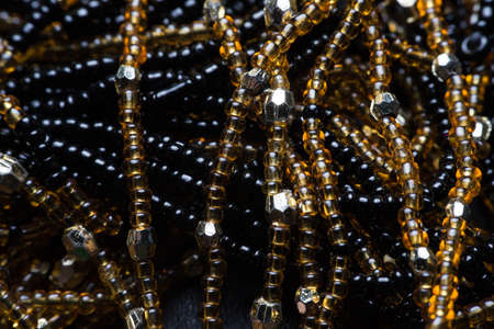 Black texture of beads. macro photo.の写真素材