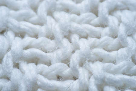 White and gray realistic knit texture seamless pattern. background for banner, site, card, wallpaper. macroの写真素材