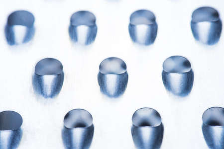 Close up of a vintage metal grater macro photoの写真素材
