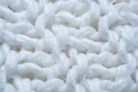 White and gray realistic knit texture seamless pattern. background for banner, site, card, wallpaper. macroの写真素材